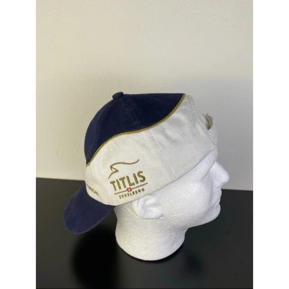 TITLIS Engelberg Cosmos Hat OS Blue White Gold Embroidery Switzerland Polydono